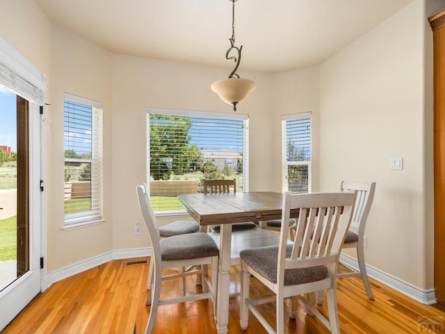 348 S Tejon Ln, Pueblo West, CO 81007 - dining area with light wood finished floors and baseboards