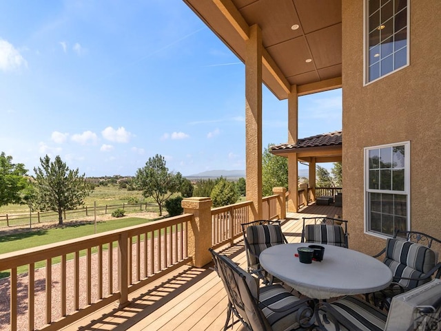 348 S Tejon Ln, Pueblo West, CO 81007 - wooden deck with outdoor dining area
