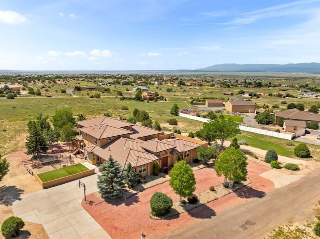 348 S Tejon Ln, Pueblo West, CO 81007 - aerial view of property and surrounding area featuring a mountain backdrop
