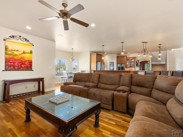 348 S Tejon Ln, Pueblo West, CO 81007 - living area with light wood-style floors, a ceiling fan, and recessed lighting