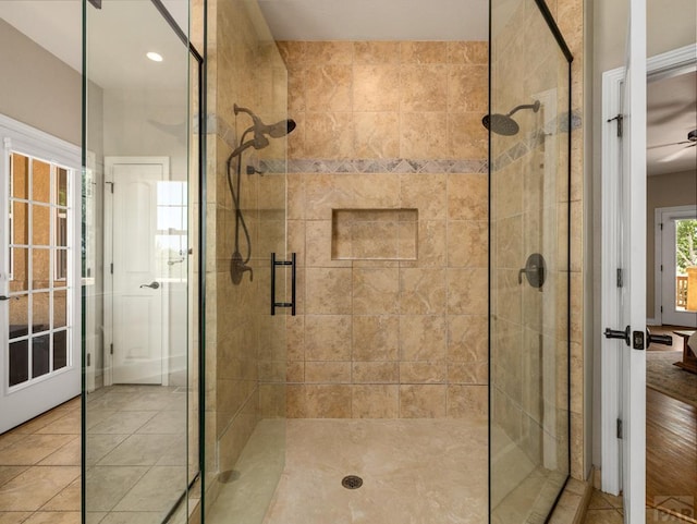 348 S Tejon Ln, Pueblo West, CO 81007 - full bathroom featuring a stall shower, ceiling fan, tile patterned flooring, and recessed lighting