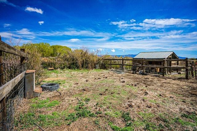 640 County Rd 571, Gardner, CO 81040 - view of yard featuring exterior structure, an outbuilding, and a fire pit