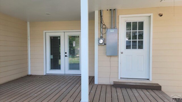 view of exterior entry featuring french doors