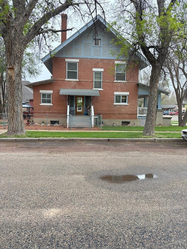 view of front of home with a chimney