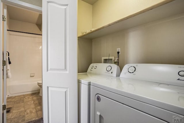 1447 Madison Ridge Hts Unit E, Colorado Springs, CO 80904 - washroom with washing machine and dryer