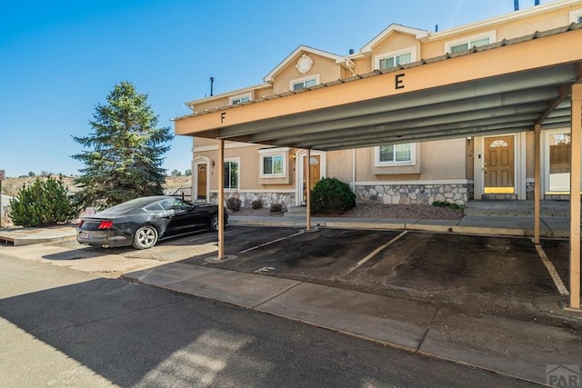 1447 Madison Ridge Hts Unit E, Colorado Springs, CO 80904 - view of partially covered parking lot
