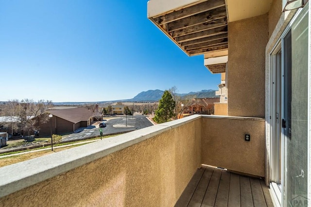 1447 Madison Ridge Hts Unit E, Colorado Springs, CO 80904 - balcony featuring a mountain view