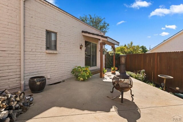 view of patio / terrace with fence