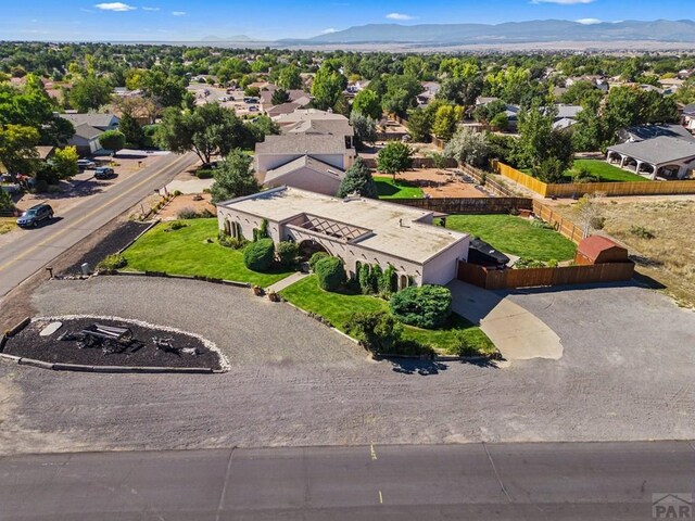 birds eye view of property featuring a residential view and a mountain view