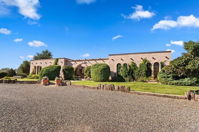 view of front of property with a front lawn