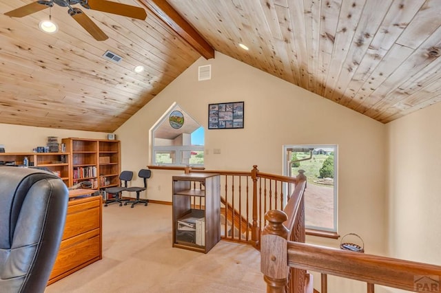 office with lofted ceiling with beams, wood ceiling, light carpet, and visible vents