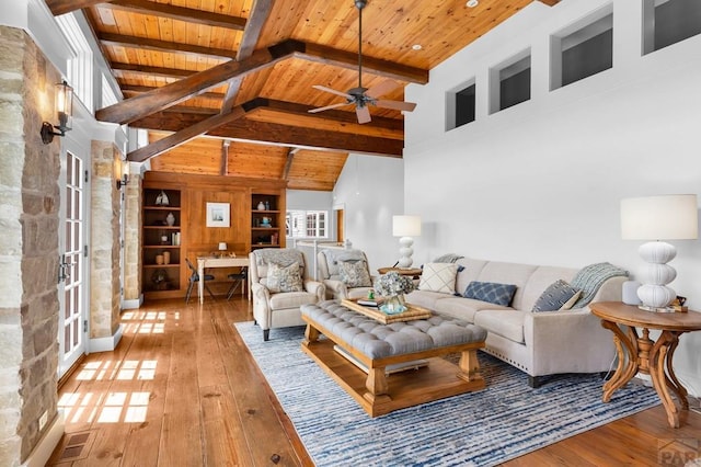 6430 Signal Mountain Rd, Beulah, CO 81023 - living room with wood ceiling with exposed beams, a ceiling fan, hardwood / wood-style floors, and high vaulted ceiling