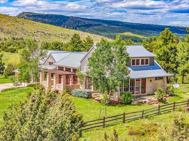 6430 Signal Mountain Rd, Beulah, CO 81023 - view of front of house featuring metal roof, stone siding, and a mountain view