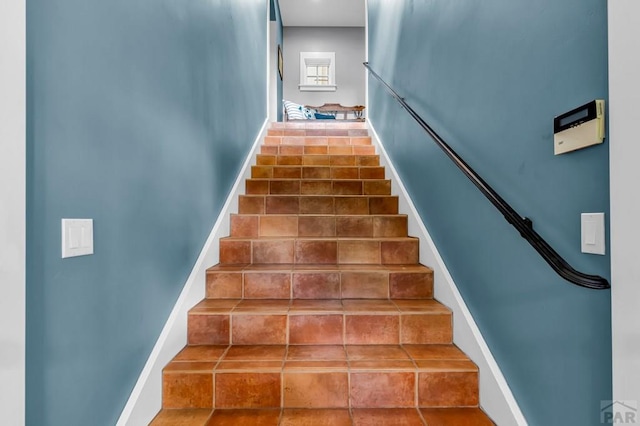 6430 Signal Mountain Rd, Beulah, CO 81023 - staircase featuring baseboards