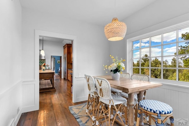 6430 Signal Mountain Rd, Beulah, CO 81023 - dining space with dark wood-type flooring and a chandelier