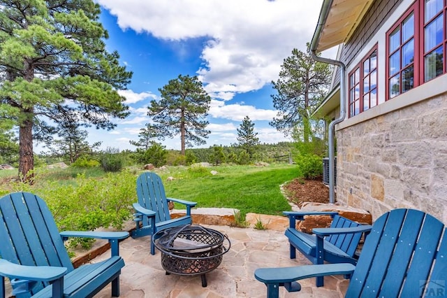 6430 Signal Mountain Rd, Beulah, CO 81023 - view of patio / terrace featuring a fire pit and central AC unit