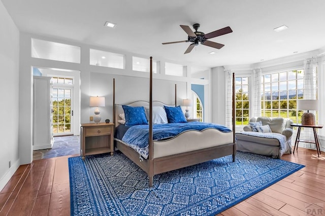 6430 Signal Mountain Rd, Beulah, CO 81023 - bedroom featuring hardwood / wood-style flooring, baseboards, and ceiling fan