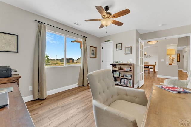 1284 N Challenger Dr, Pueblo West, CO 81007 - sitting room featuring light wood-type flooring, ceiling fan, and baseboards