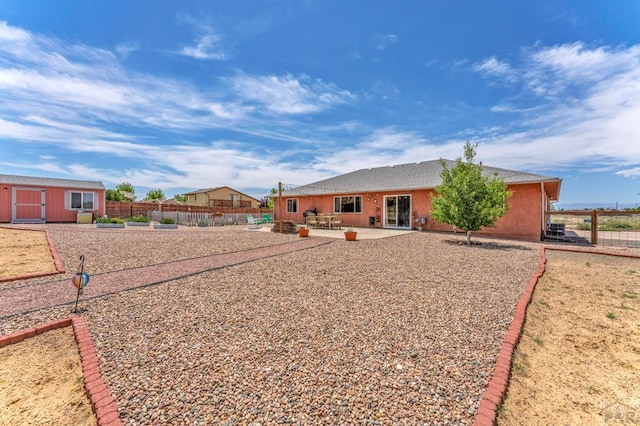 1284 N Challenger Dr, Pueblo West, CO 81007 - back of property with a patio
