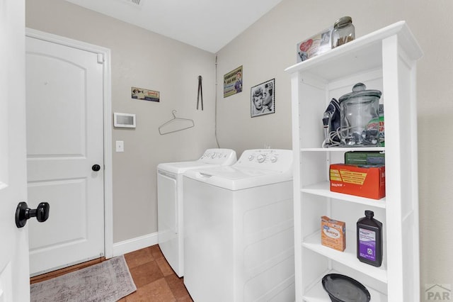 1284 N Challenger Dr, Pueblo West, CO 81007 - washroom with washing machine and clothes dryer and baseboards