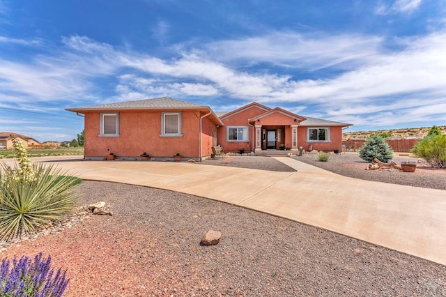 1284 N Challenger Dr, Pueblo West, CO 81007 - view of front facade featuring concrete driveway