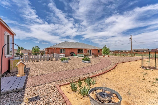 1284 N Challenger Dr, Pueblo West, CO 81007 - fenced backyard featuring a patio