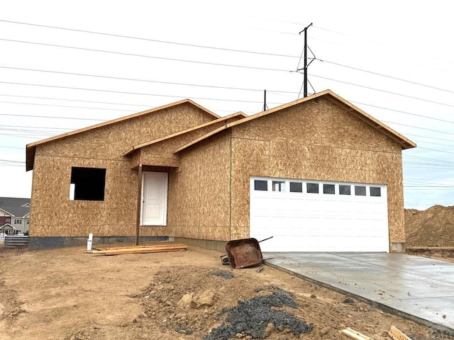 5220 Gannet Ln, Pueblo, CO 81008 - property under construction with a garage and concrete driveway