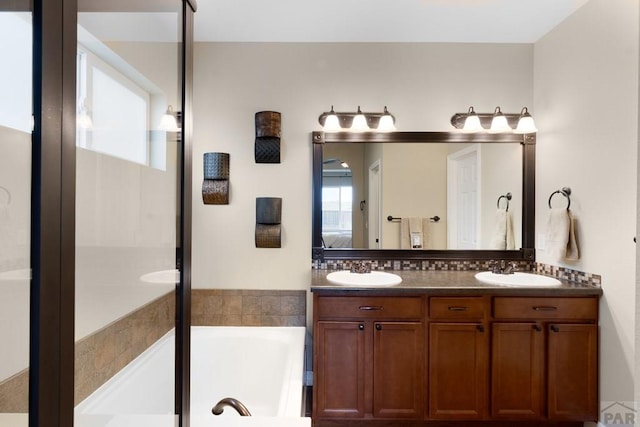 4288 Cedarweed Blvd, Pueblo, CO 81001 - full bathroom with a bath, double vanity, and ensuite bathroom