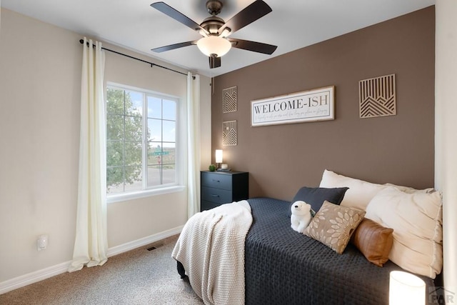4288 Cedarweed Blvd, Pueblo, CO 81001 - carpeted bedroom with baseboards and a ceiling fan