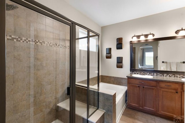 4288 Cedarweed Blvd, Pueblo, CO 81001 - bathroom featuring a garden tub, vanity, and a stall shower