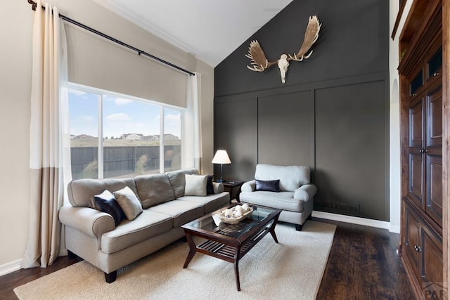 4288 Cedarweed Blvd, Pueblo, CO 81001 - living room featuring dark wood-type flooring and lofted ceiling