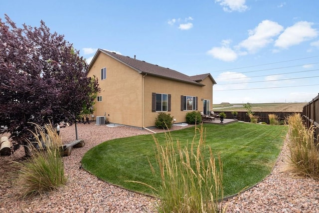 4288 Cedarweed Blvd, Pueblo, CO 81001 - back of property with stucco siding and a fenced backyard
