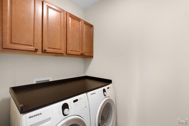 4288 Cedarweed Blvd, Pueblo, CO 81001 - laundry room featuring separate washer and dryer and cabinet space