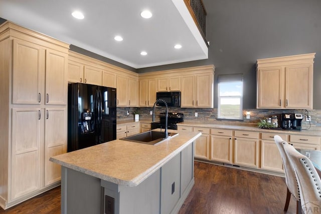 4288 Cedarweed Blvd, Pueblo, CO 81001 - kitchen featuring black appliances, light brown cabinetry, light countertops, tasteful backsplash, and recessed lighting