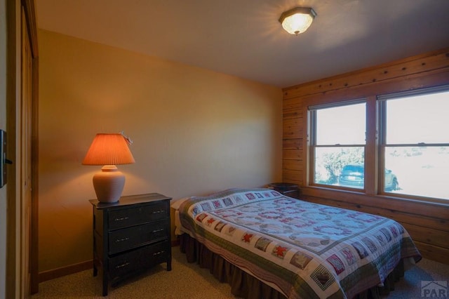 bedroom with light carpet