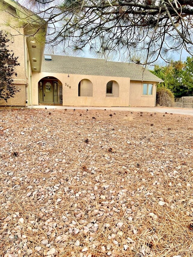 exterior space with stucco siding