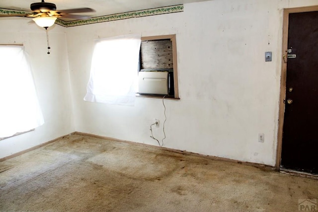 2006 W 13th St, Pueblo, CO 81001 - carpeted spare room featuring plenty of natural light, a ceiling fan, and cooling unit