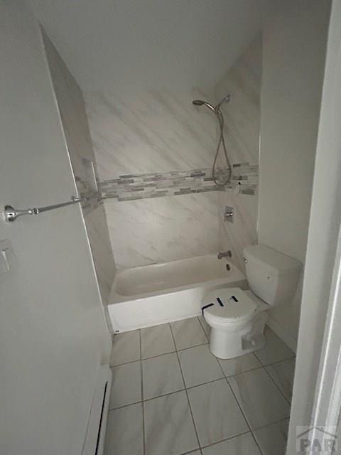 21 Terrace Dr, Pueblo, CO 81001 - bathroom featuring tile patterned flooring, toilet, and shower / washtub combination