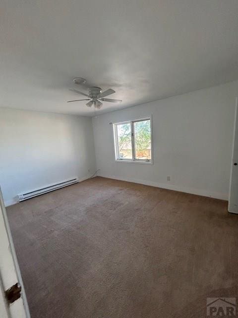 21 Terrace Dr, Pueblo, CO 81001 - carpeted empty room featuring a baseboard radiator, ceiling fan, and baseboards