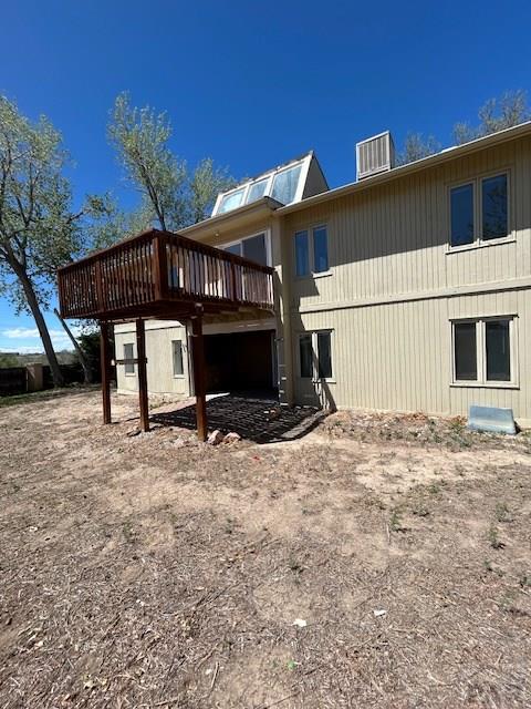 21 Terrace Dr, Pueblo, CO 81001 - back of property featuring a wooden deck