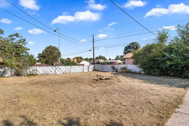 view of yard featuring fence