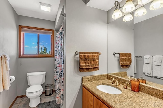 bathroom with tile patterned flooring, toilet, visible vents, vanity, and baseboards