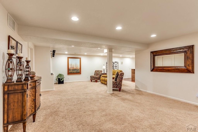 sitting room with light carpet, baseboards, visible vents, and recessed lighting