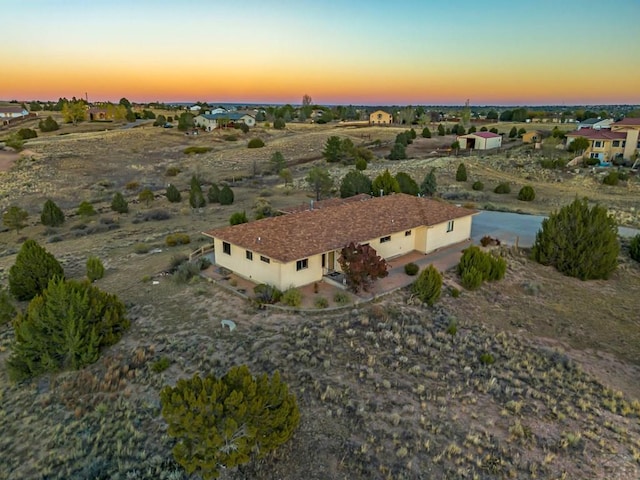 view of aerial view at dusk