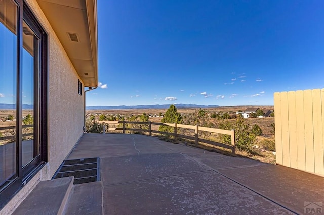 view of patio with visible vents