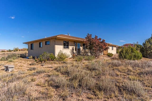 view of front of property featuring stucco siding