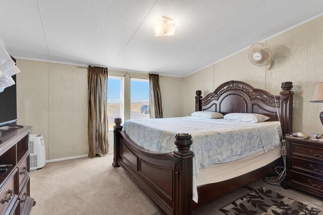 bedroom featuring light carpet and ornamental molding