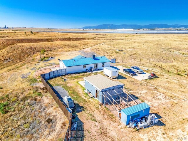 bird's eye view with a rural view and a mountain view