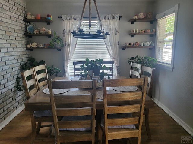 2602 3rd Ave, Pueblo, CO 81003 - dining room featuring baseboards and wood finished floors