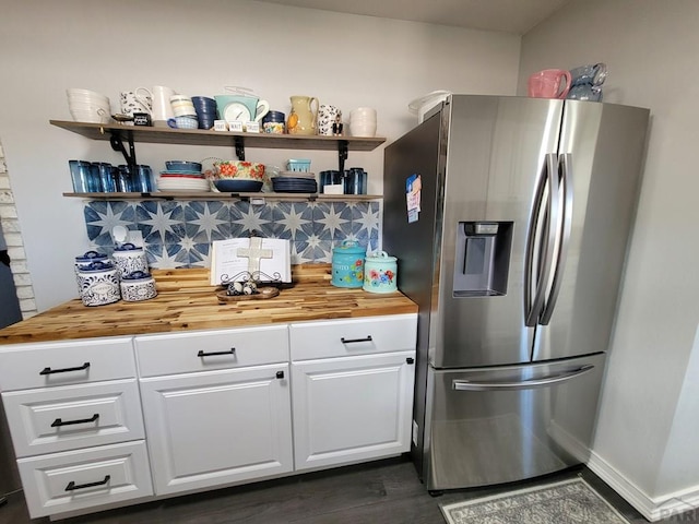 2602 3rd Ave, Pueblo, CO 81003 - kitchen featuring stainless steel fridge with ice dispenser, wooden counters, and open shelves